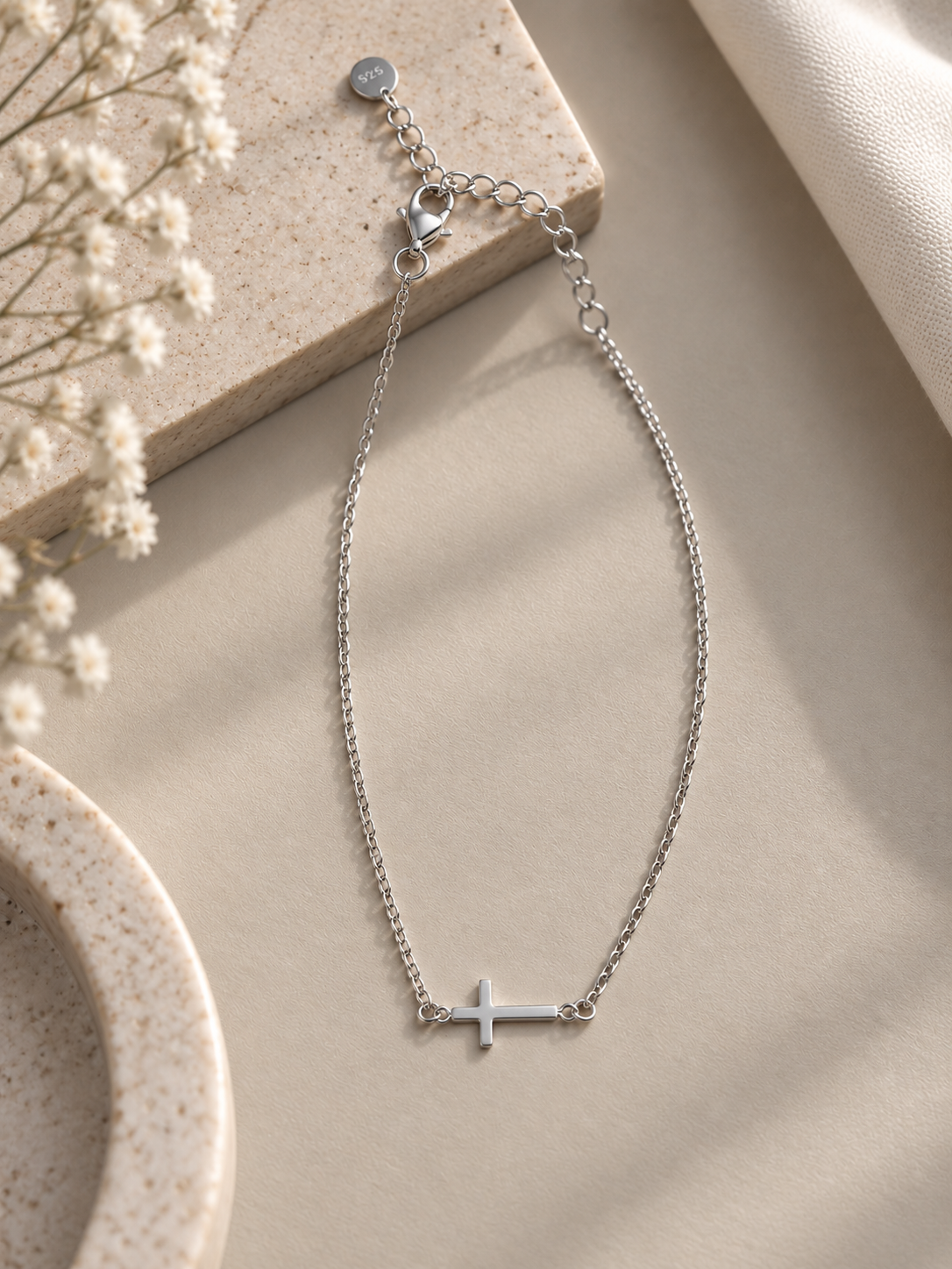 Silberarmkette mit Kreuz